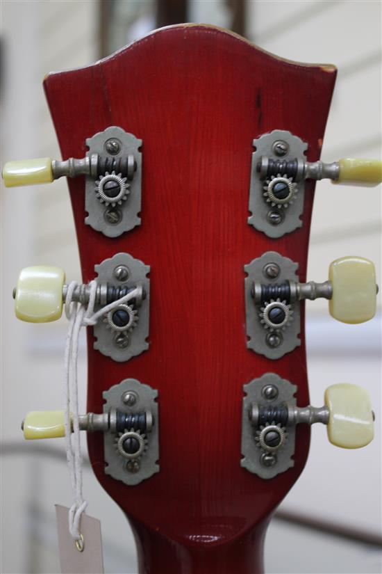 A cherry red Hofner Verithin semi-acoustic electric guitar, c.1964,